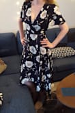 This dress is GOEGROUS and flattering. Took me a few tries to figure out how the wrap was supposed to be, but when I got it, it was perfect all day! I felt confident & sexy in it. Perfect for night out with friends or date night. The fabric was so comfortable and light. I did put an undershirt on under the dress because I wasnt comfortable having the girls out. Definitely one of my top go to dresses for an evening out. - Erika P.