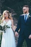 The dress looks beautiful, fits perfectly. The material is very nice. I love the lace. The color isn't snow white but it looked great anyway! - Ivica M.
