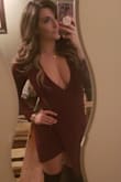 I got this in a small even though I would normally be a medium and it fit perfectly! The zipper was challenging to get up on my own because it does go all the way up to your neck. I didn't need to wear a bra but felt completely secure which is amazing since I am a 32DDD. Material is nice and thick and it is very comfortable. I wore this for my shift as a shot girl and will wear it many more times for sure! - April L.