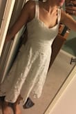 Pretty dress, true to size, good modest length, great for a wedding shower. - Gaby K.