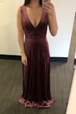 This is an awesome dress! It is very soft and flowy but it is a bit thick as it is a velvet/velour material, so it may be best suited for events in cooler months. The waist was a little loose on me (24" waist, got an XS) but it wasn't bad. Be sure to get a plunge bra for this one if you want to wear one with this dress! I got a plunge bra off Amazon for $8 and it was great! - Carolina C.