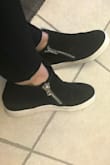 I assumed they were a typical wedge where they are teller in the back then the front. These have flat with no angle "wedge". They do have a lift of 1" on the bottom. Comfy and cute to wear with jeans or leggings for an athleisure look. - Mandi Y.