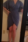 Because of my hip/leg size the dress doesn't close as much in front as it should, creating a much higher slit. I would size up if this were a returnable item. The dress will work, but I'll have to be more mindful of the high slit up front. The color is true to the picture and the material is light as advertised. I plan to wear this in warmer weather and was concerned about perspiration showing, so I put a little water on the dress and it dried very quickly. The dress could accommodate larger breasts just fine! - Meleah B.