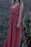 I wore this dress for engagement pictures, and I loved it! It was long on me, but with 2 inch heels it was perfect. It was a little loose up top, but I'm a 32B on a good day, so I just used some fashion tape to keep the dress from falling forward. It wasn't really needed. Highly recommend this dress! - Lindsey S.