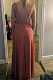 This dress is perfect for anyone who needs a little extra length. I am smaller up top so it's a little big, but I wouldn't have gone down a size at all. Shipping time was fast and the color is true to the photos provided. I am 5'10 and it's long enough for me to still wear heels with it. - Julia K.