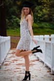 I normally order extra smalls, but it was unavailable at the time and I needed the dress for graduation. The top was loose but the overall fit of the dress was great! I loved the lace detail and it was a standout for sure! I received numerous compliments! - Marissa R.