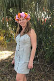I wore this all day at a fair. Was comfortable and fit very well. The pockets on the front were great. I didn't have to carry a purse. Received lots of compliments. - Mary L.