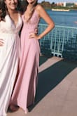 I wore this dress to my junior prom. It has always been a struggle to find dresses that fit my body well and this dress fit me perfectly! I am fairly tall and have a small chest. This dress was so beautiful and so flattering. The color is even better in person. 
Very pleased! - Ellie H.