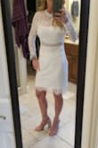 I wore this dress after my wedding in Las Vegas. Got a ton of compliments. Fit perfectly. - Sandy F.