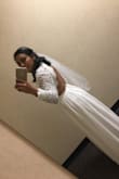 Good quality materials. I ordered medium which was the wrong size because it was too big and I had to get it fixed. I think a small or extra small would have worked better. It was a beautiful dress for my wedding at the court. A couple of girls made compliments about my dress that day. - Sandra T.