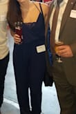 I wore this jumpsuit to a charity event, and also have worn it on a day where I was relaxing and hanging out with friendw by the water. It really can be dressed up or down. It's very comfortable. I had a lacey navy bandeau to wear since it is quite loose at the top. It was a bit larger for me, but I pursued the typically unrecommened act of putting it in the dryer to shrink it a bit. Hey, it worked. And I still really like this piece. - Taylor H.