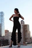The material is really nice and the jumpsuit fits so true to size. I have a smaller chest so it was harder to fill, but it still fit very nicely. Would purchase in other colors. - Jessica L.