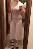 I always struggle with finding jumpsuits that fit, but this was too cute to pass up! I ordered a small and a medium. The small was definitely too little! The medium fit well, but just looked awful on me! Didn't flatter my curves and made me look larger than I am! This is definitely for a more petite lady. - Emily H.