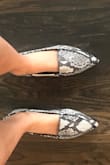 Due to reviews I ordered half size up and it fits comfortably in length. I have very narrow/skinny feet and the shoe is so wide that it looks too big although it's not. Keep this in mind when ordering. If I had ordered my regular size, it would have been tight. - Michelle D.