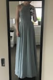 I bought this dress as a bridesmaid dress for a friend's wedding, and it was my first time shopping at Lulus. The dress came in perfect condition, and I was incredibly impressed by the dress fit, material, and just sheer quantity--it's a LOT of dress! It moves beautifully and the color is exactly as shown. I'm 5 ft 1, so obviously the dress was quite a bit too long on me as you can see in the picture, but I'm used to getting dresses hemmed so this wasn't an issue for me. - Julia B.