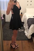 the material is very nice, a lot better quality than I was expecting. Wore for homecoming, got compliments. Loved the open back! First time ordering from this website and was happily surprised. Paired with black heels, and gold necklace/earrings/rings. - Erica
