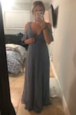 It's a beautiful dress but however it does run a little large in the cleavage area. I'm 4.5 months pregnant and even though it's a wrap dress I would need to get a button put on because it's too big. Length is a little long as well, but I did not try on with shoes. I love the sleeves though! Needed a dress for a wedding so not sure if I'll keep yet. - Alexis H.