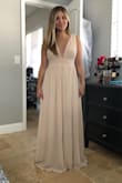 This dress fits PERFECT! I don't need a thing done to it! I did originally ordered a XS but it was a little too snug and I couldn't get it zipped. I am 18 weeks pregnant so I still have some wiggle room. Bought this dress for a wedding, not wearing shoes in the photo so it does look long, but once shoes are on its perfect. Couldn't say enough great things! - Alexis H.