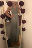 I love the way this dress looks and I cannot wait to wear it once the weather finally starts warming up. It is very classy yet sexy with the open back and slit in the skirt. I love the neckline of the dress as well. The strings are really long in the back, but I just tucked them in and it looked fine. I would definitely recommend this dress. - Savannah S.