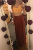 This cover-up is stunning. I love the color of it and because it is high waisted it really makes your waist look smaller, which is a plus. The material of the skier is a little thin, but you don't want a super heavy skirt while you're at the beach or in summer weather. It was really flattering and I think anyone would look great in it. - Savannah S.