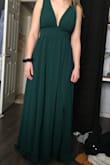 This dress was a perfect fit. Love the color and quality. Only disappointment was having to pay 45$ extra duty upon arrival. - Karen B.