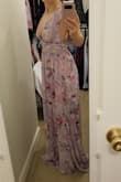 I bought this to wear as a guest to an upcoming wedding. If I don't go for some reason, I may have to crash someone else's just so I have an excuse to wear it. It really is that beautiful! Most reviews say it runs small but I am a solid size small and it fits around my torso beautifully. I will have to get the straps shortened because they are long and the hem shortened because I am so short, but this dress is definitely worth the extra effort and cost in my opinion! - Emily K.