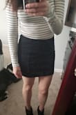 This is a really cute top. Looks great tucked into pants and skirts. It is definitely on the shorter side than what I thought but it stays tucked in even though I'm pretty tall. Happy with this purchase! - Sarah J.