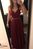This dress is soooo pretty! It fits me really well with the exception that it is too long. I'm 5'6 and wear a 0 or 2 pant and even with heels on, the dress will need to be hemmed. I'm wearing heels in the picture. - Lauren V.