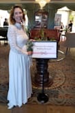 Loved the look, vibe, long sleeves and slit to show your legs. Was super long though. I wore really high heels. I'm a dance instructor for the bride and groom's first dance and I needed it for a wedding show to dance in. Super fun! - Jill F.