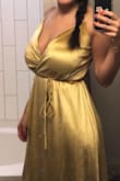 Wore this dress to my company's fundraiser gala and got SO many compliments. I was worried it wouldn't be dressy enough because it has some visible strap adjustments you can't really see in the photos but it ended up working great. It's so comfortable and is a true wrap dress so the size is adjustable, which I love since I have a pretty small waist compared to the rest of me. The satin is gorgeous and makes it a perfect winter or spring look because of the color. Love it! - Corey M.