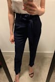 I was hesitant about the size at first after seeing model wears S. I decided to order the same size. They look exactly the same as in pictures. They fit me perfectly. I'm very happy with my purchase. - Burcin L.