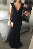 This dress fit in all the right places! I did have to get it altered, but I'm 5'0" so no suprise there. The material is super high quality and a tad thick, so you're tummy doesn't show. Would buy again! - Nicolette B.