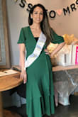 I bought this dress for my bridal shower and it was perfect for the event. I loved the quality of the dress and the color was just gorgeous. The buttons gave the elegant, stylish look to it. I  can't wait to wear it again. - Aycan E.