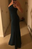 I love the thick material of this dress! What a great price also. This dress is so flattering. It's tight enough in my bust area that I don't even need to wear a bra! I would have picked a small dress, but then my bust wouldn't fit. I was nervous the medium would be too big on the waist but it was just right!! The length is also perfect. And the color is beautiful. There's nothing I don't like about this dress! - Tara K.