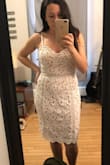 Typically this style dress is pretty flattering on me, but this dress was not. This dress was extremely unflattering and make me look really wide and the way the fabric laid on my stomach was terrible. When I sent this photo to my mom and sister they were also surprised by how it made my figure look. I would also have to say the fabric and design on the chest area was not what I though it would be. It's not one piece, the bust sections are added on additionally making the chest have this circle shape. I personally would not recommend this dress for any woman who have wider hips, I think that may have been my issue. - Kirsten M.
