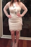 I order a medium at first because I'm never a small and it was way too big under the arms and in the waist. Returned it and ordered the small and it was perfect. Sleeves are a little long but totally fine! Wore it to my bachelorette party and was comfortable all night in it. - Laurie D.