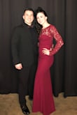 The dress was beautiful and so perfect for a foundation fundraiser, "The Red Dress Ball" that was derby themed. The material was thick, but lightweight- it is fully lined. I was able to move around freely and felt like a million bucks! The dress was long- I had to wear the tallest pair of heels I own, but I'm on the short side, so that was to be expected. - Hannah G.