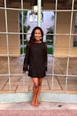 I wore this for my college ring ceremony, and it was perfect! It's a tad short overall, but the sleeves are a great length and it fits comfortable around the waist and hips. - Maya J.