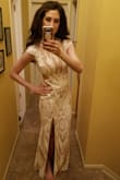 I am absolutely in LOVE with my dress! I bought it to wear to my girlfriend's Indian wedding this summer, I wanted something classy and elegant while also being a bit sexy. This dress went above and beyond my expectations!! It is beautifully made with intricate sparkle and beading detail and the cuts in the sides of the dress give it a super sexy appeal. I love that its white because it's very rare to be able to wear white to a wedding and since the bride will be wearing red I was super excited to rock a white gown! Thank you so much for designing such an amazing dress that I feel fabulous in. Hopefully the sparkles that make me smile will do the same for every girl that orders it too! - Stephanie D.
