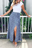 Breathable skirt! Has a zipper closing on the side but it sits right above the belly button. Can flap open when it's windy so be careful but this has become one of my summer staples. - Jamella A.