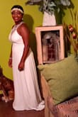 Dress worn to an all white event for family reunion! Dress had to be altered: it's too long and fits really tight when zipped up,but I managed to make it work! - Detoria S.