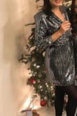 Wore this out in NYC on NYE and got so many compliments! I'm very tall, so it was super short and I had to pin the inside. Otherwise, it was great. - Adelle S.