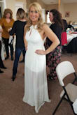 This dress was perfect for my Bridal Shower. I ordered a medium, and I was impressed with the quality and fit. It was very comfortable, and I received so my compliments. The sheer piece was a little long, and I stepped on it a few times and it could of used a little hem, but I didn't have time an inch taller with my shoes it would have worked out fine. The underneath dress was a little short when sitting I have a booty and thick thighs & have an athletic figure so a slimmer figure may mot have the same issue. Other than that I absolutely Loved this dress! - Brittany W.