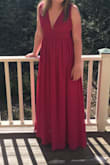 I ordered this dress for my junior prom, and I absolutely loved it. I had to have the straps taken in a bit because the top of the dress was too big for me but it was a really easy fix. Once I put my heels on, the length was perfect. The zipper was a bit hard to zip due to the fabric but it wasn't too much of a problem. I wore it with a layered gold necklace and black heels. I loved how it flowed on the bottom and that both the front and back scooped down. I would highly recommend this dress to anyone. - Riley S.