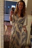 This could not be a more perfect dress for a summer vacation. It's lightweight, flowy, and sooooo comfortable. Plus, if you are fair skinned like me and can't really do all day in the sun in a tank dress for threat of sunburn, this is ideal. It definitely runs loose - I usually wear a medium in Lulu's items, but even the small was loose on me. So size down! On the plus side, the elastic waist band makes it super comfortable and versatile. The modesty snap makes the loose top fit just right. Can't wait to wear this on an upcoming trip to Cuba, or just out to a beer garden in the heat here in Austin. - Ramona V.