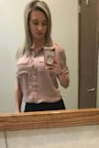 Absolutely love this top for work. Looks great tucked in or un-tucked as well. When untucked it hangs down just enough to cover your rear. Not at all see though so I love that I don't need to wear an under shirt with it. Dusty pink color (mauve) is beautiful. I also purchased the teal green color because I loved it so much! Also, doesn't wrinkle too much throughout the day. Does wrinkle a bit after washing/drying so I have to use a hand steamer to get some of the big ones out. - Mandi Y.