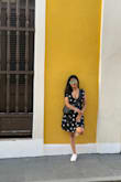 This dress is very cute wrap around. Although there is a deep front cut, I love this dress and would recommend it for any petite girls like me. - Shruthi G.
