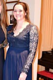 It was a great dress. It looked great for a formal ball I attended at my university. The sleeves were a bit tight, but I have beefier arms than the average female. The back clap broke at the end of the evening but other than that is was good quality. - Megan J.
