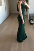 Great dress, perfect coverage for a wedding, gala or night out. It is long enough for someone my height (5'8) with a medium heel. Looks like a silk crepe, but has stretch and nice coverage. - Allyn R.