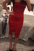 I have been ordering from Lulus for years...(almost every dress I own is from here). I am normally very happy with their items, but was extremely dissapointed with this dress. It was very tight in the abdomen area, and just fit awkwardly. The material itself was kinda cheap feeling/looking as well. I thought it was just me , but after showing a few people how I looked, they agreed that the dress was very unflattering. I always order an XS from Lulus and have to get it slightly altered, which is the norm because I am just a small person. Maybe it would have looked better had I gotten a size small, but the material would have still felt cheap and I think it still would have been unflattering because of the cut of the dress and material.
I'm not only disappointed with how the dress looked, but I also am bummed with Lulus in that they aren't even giving me a full refund, ESPECIALLY considering I have been such a loyal customer for years (I.e have bought very many dresses from them, I post/tag them on Instagram, I tell all my friends to buy their items). - Cara S.